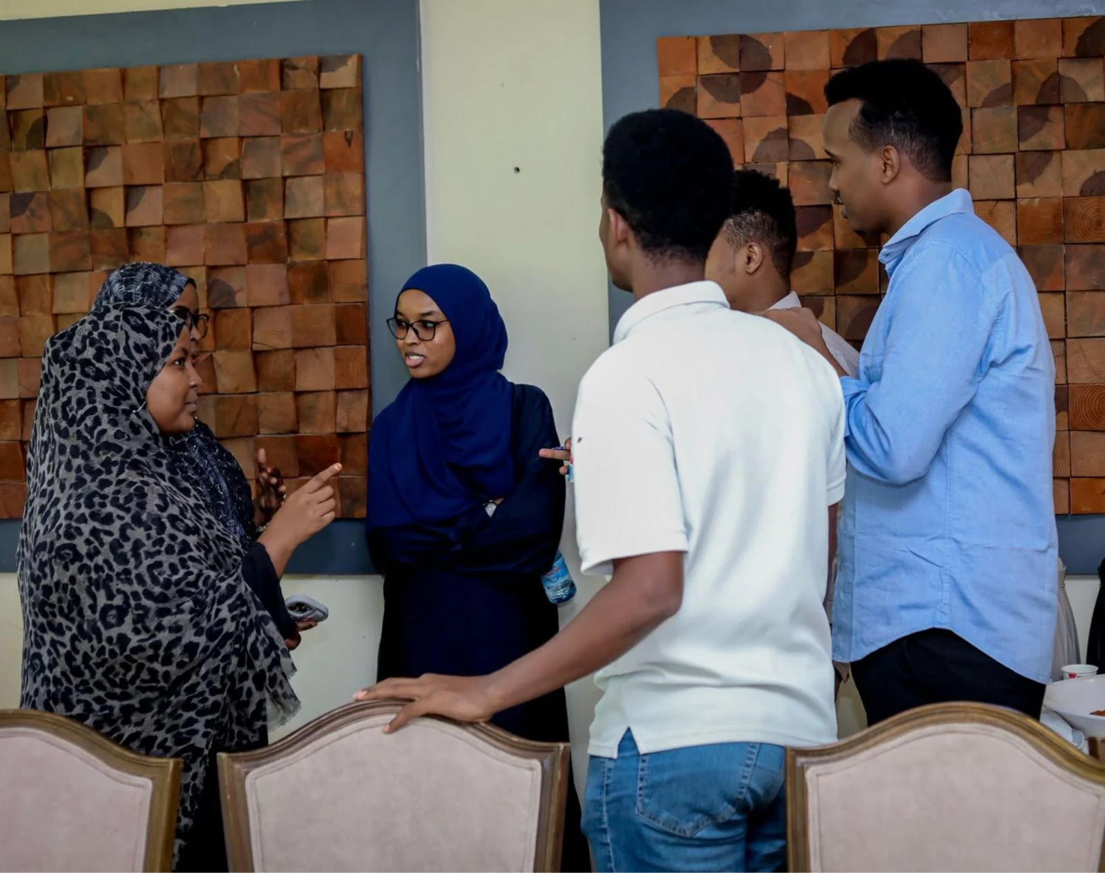 Workshop participants discussing together in a small group